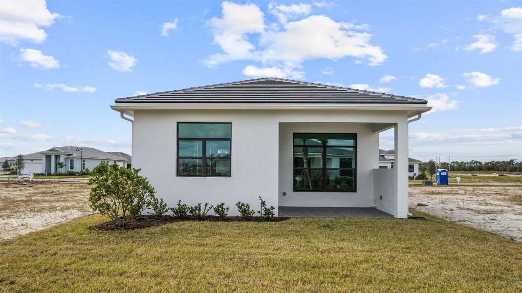 Exterior details and patio area of a home in , Port St. Lucie (Image 24).