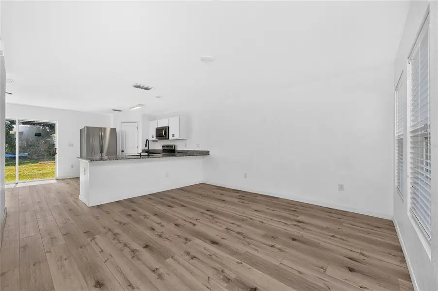 Spacious, unfurnished interior of a new home in , Port Charlotte (Image 53).