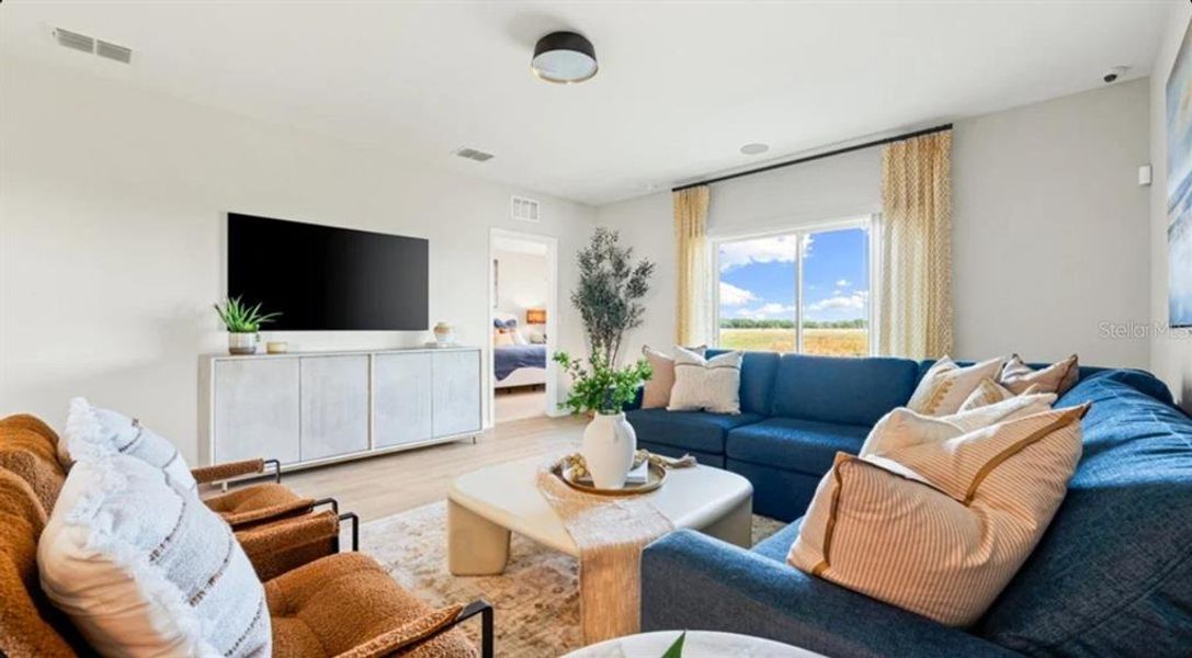 Furnished interior view inside a new home in Waterstone, Groveland (Image 12).