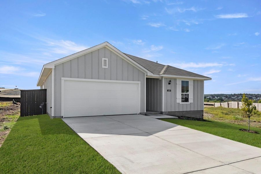 Front exterior of a new home in Cloverleaf, Austin, TX, highlighting curb appeal (Image 19).