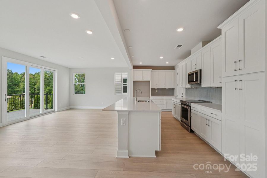 Kitchen into dining Kitchen into dining