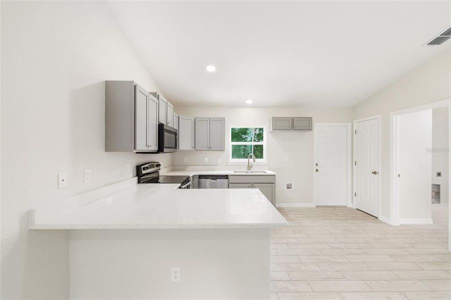 Furnished interior view inside a new home in , Ocala (Image 9).