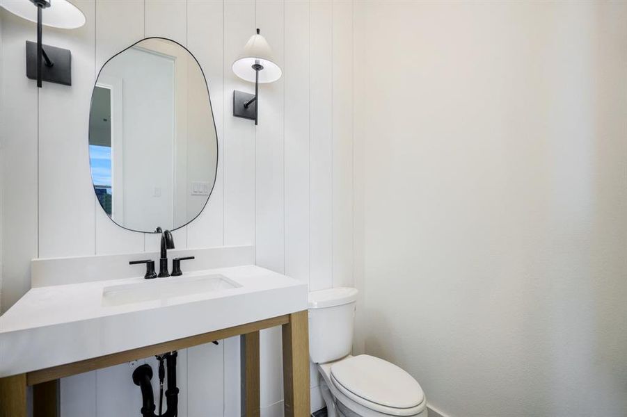 Bathroom featuring toilet and sink