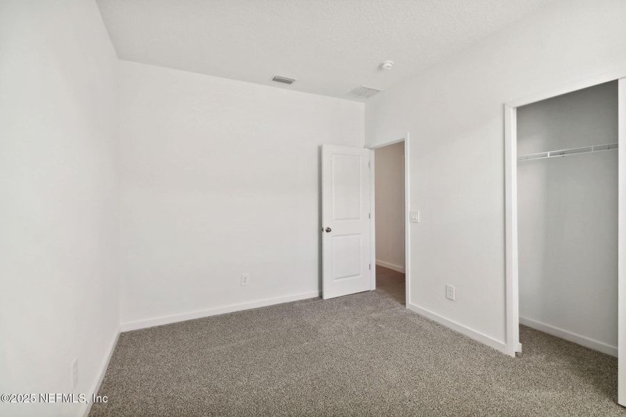 Spacious, unfurnished interior of a new home in Cypress Meadows - Signature Series, Jacksonville (Image 12).