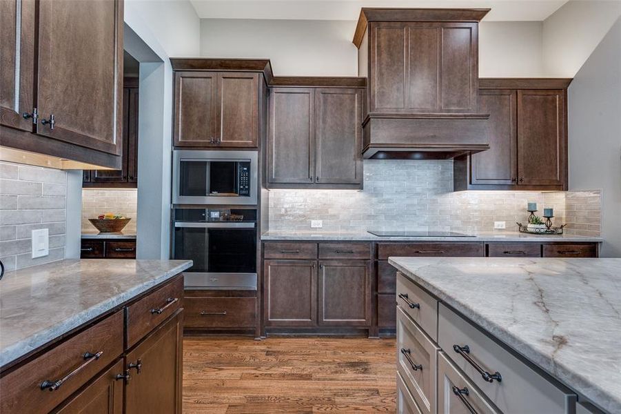 Luxury upgrade, Taj Mahal quartzite countertops throughout