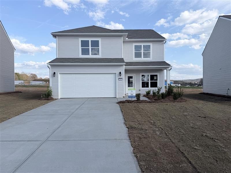 Front exterior of a new home in , Rockmart, GA, highlighting curb appeal (Image 1).