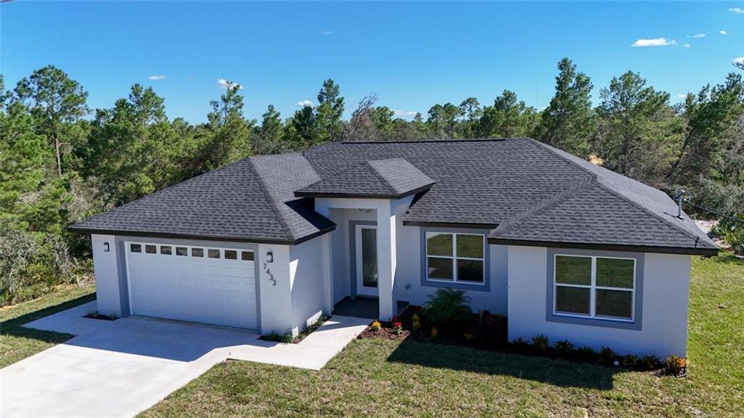 Front exterior of a new home in , Sebring, FL, highlighting curb appeal (Image 17). Front exterior of a new home in , Sebring, FL, highlighting curb appeal (Image 17).