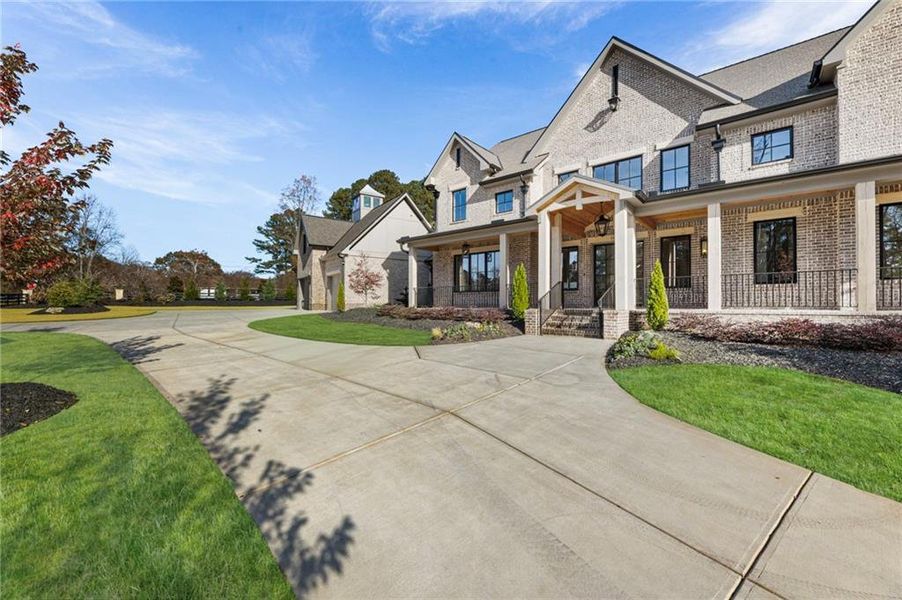 Front exterior of a new home in , Alpharetta, GA, highlighting curb appeal (Image 31).