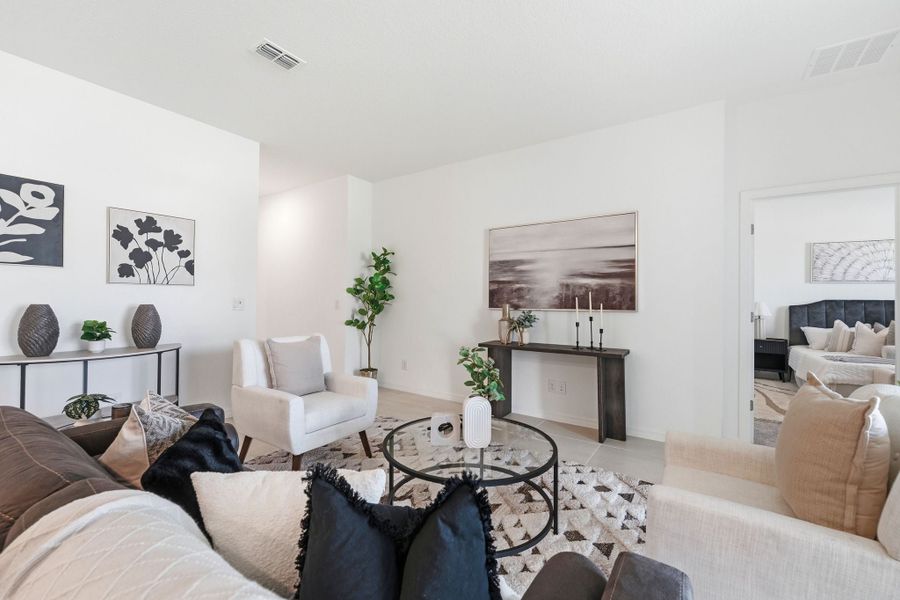 Furnished interior view inside a new home in Trinity Gardens, Deland (Image 7).