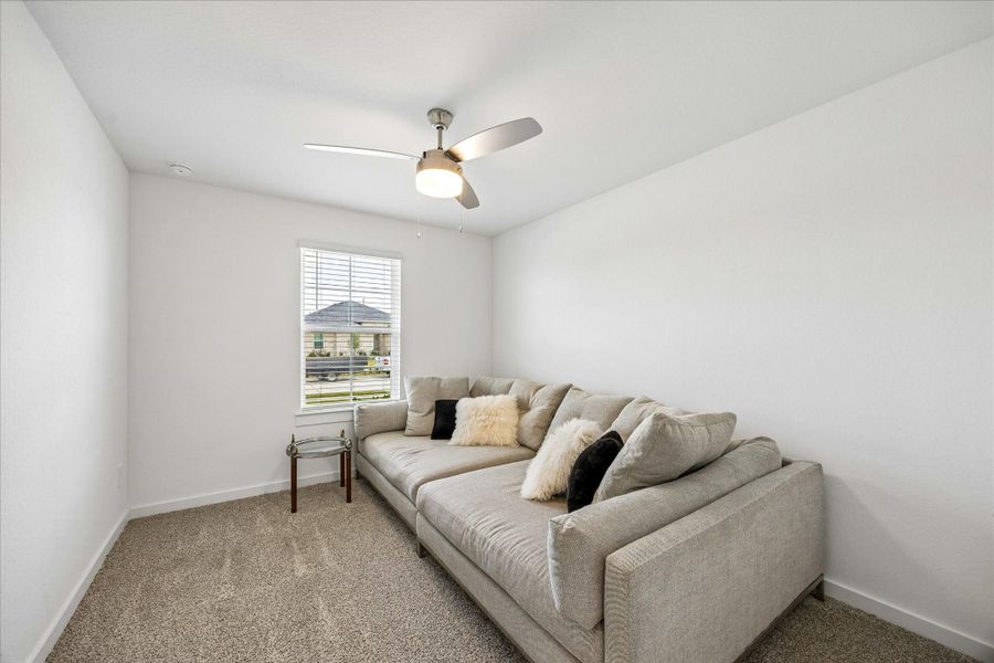 This is the first of the 3 bedrooms at the front of the house.  It is approximately 13' x 10'.  Ceiling fan was added.