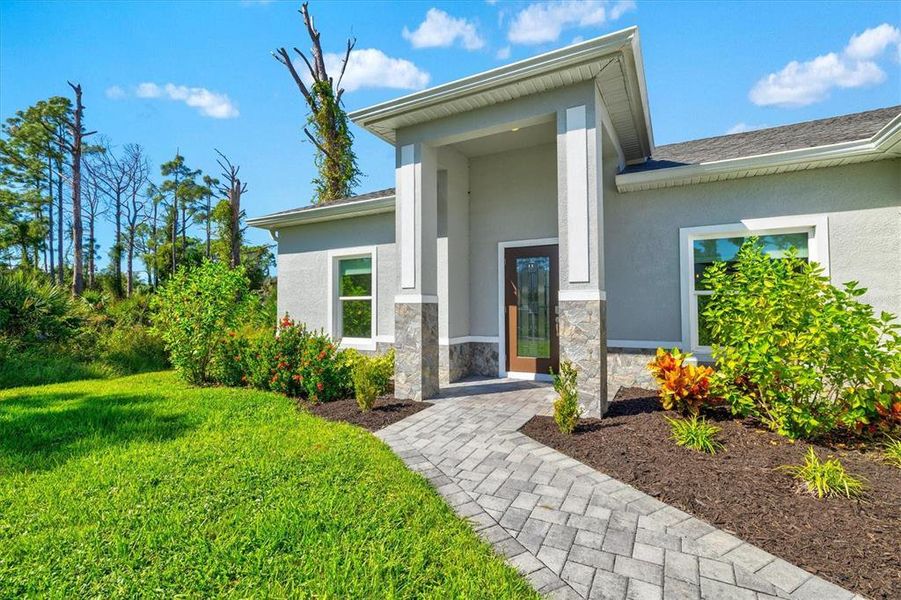 Exterior details and patio area of a home in , North Port (Image 20).