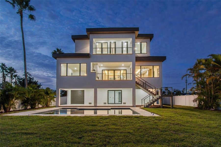 Front exterior of a new home in , Treasure Island, FL, highlighting curb appeal (Image 28). Front exterior of a new home in , Treasure Island, FL, highlighting curb appeal (Image 28).
