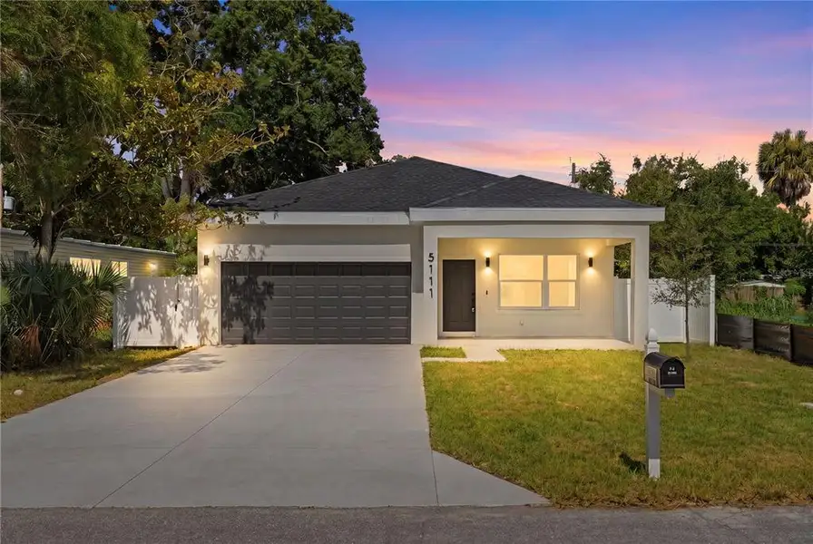 Front exterior of a new home in , St. Petersburg, FL, highlighting curb appeal (Image 1). Front exterior of a new home in , St. Petersburg, FL, highlighting curb appeal (Image 1).