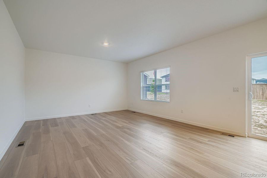 Spacious, unfurnished interior of a new home in Eastcreek Farm: The Camden Collection, Thornton (Image 8).