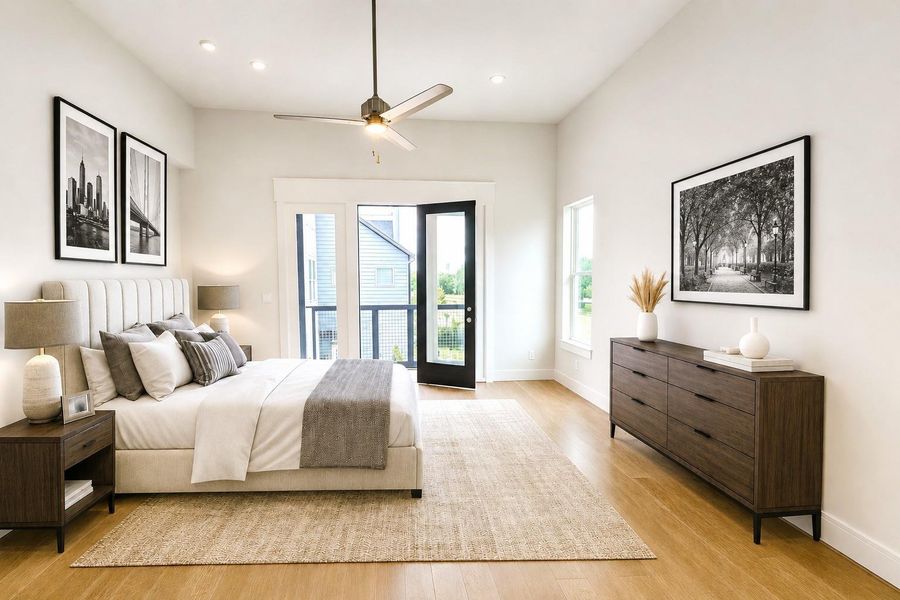 Primary Bedroom with Private Balcony.  Wide Plank Wood Flooring.  Virtual staging added.