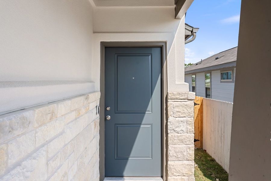 Exterior details and patio area of a home in Sage Hollow, Kyle (Image 15). Exterior details and patio area of a home in Sage Hollow, Kyle (Image 15).