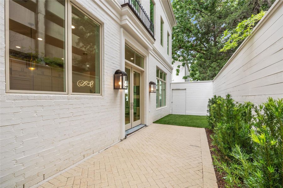 Rear patio is equipped with a gas stub. This tranquil outdoor area is a perfect extension of your living space. A 10-foot fence provides privacy while entertaining or enjoying the yard. Options for patio upgrades include brick pavers, artificial turf, landscaping, or trellis along the fence. *Photo is of another home in the community and for informational purposes only.