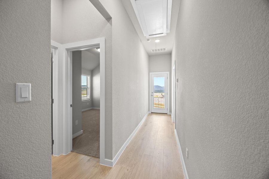 Spacious, unfurnished interior of a new home in Lakeside at Tessera, Lago Vista (Image 27).