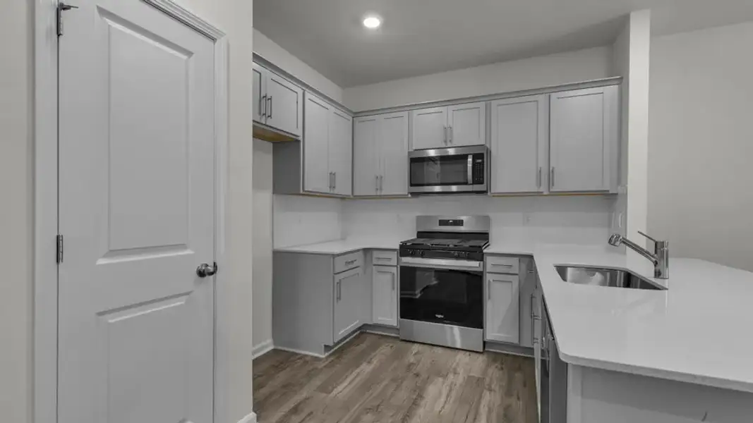 Furnished interior view inside a new home in The Townes at Prestleigh, Wake Forest (Image 6).