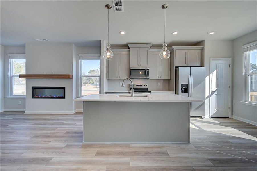 Furnished interior view inside a new home in Enclave at Evergreen, Fairburn (Image 5).