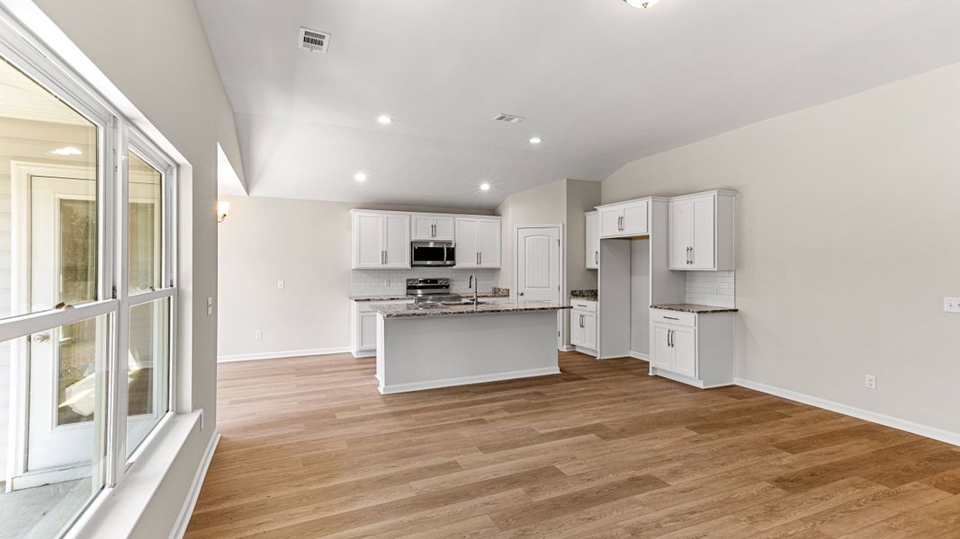 Representative furnished interior of a home built from the The Holly by Smith Family Homes in Lakeview Pines, Statesboro (Image 8).