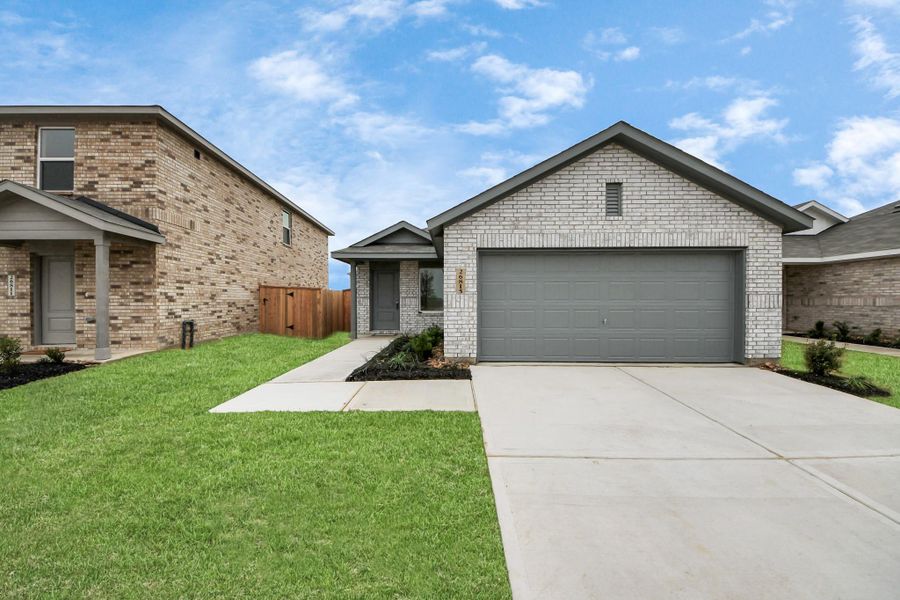 Front exterior of a new home in Anniston, Katy, TX, highlighting curb appeal (Image 1). Front exterior of a new home in Anniston, Katy, TX, highlighting curb appeal (Image 1).
