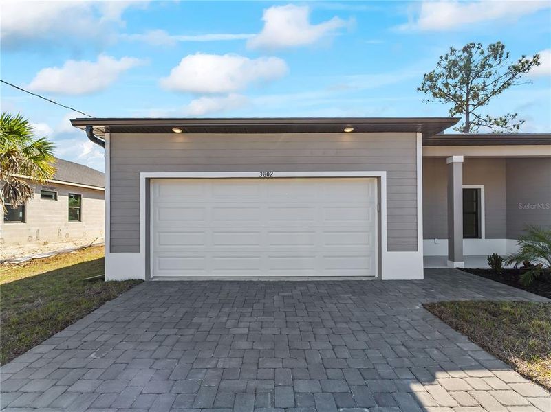 Exterior details and patio area of a home in , North Port (Image 35).