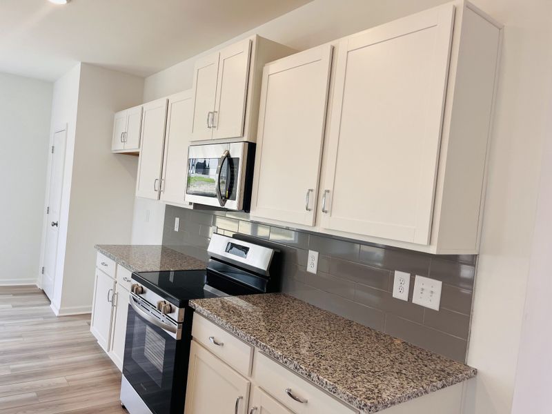 Furnished interior view inside a new home in Marlin Pointe, White House (Image 3).