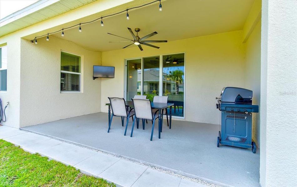 Exterior details and patio area of a home in Archers Mill, Ormond Beach (Image 3).