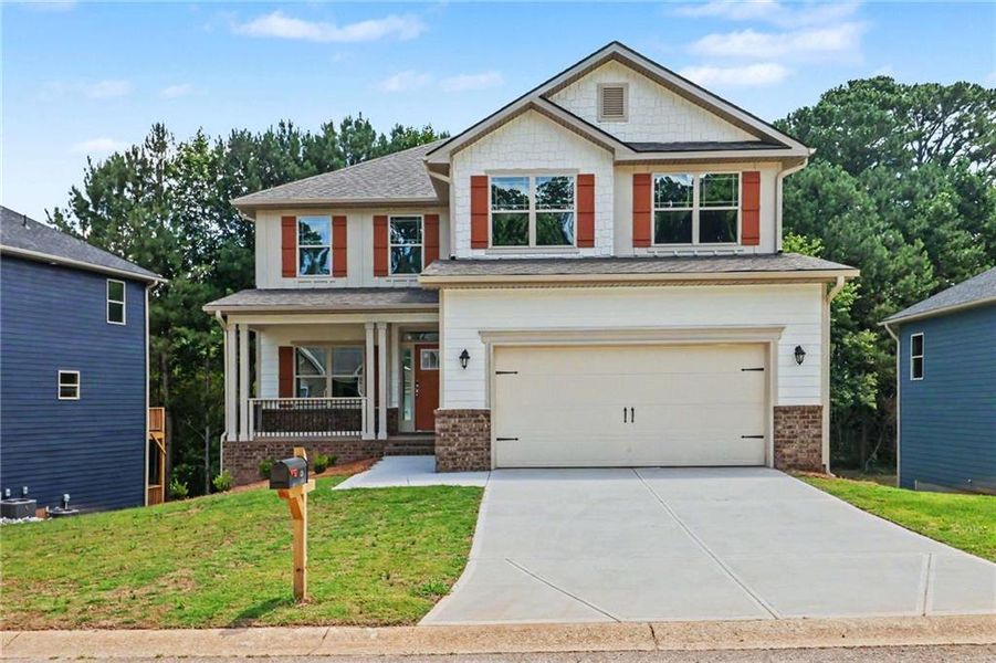 Front exterior of a new home in Magnolia Villas, Cornelia, GA, highlighting curb appeal (Image 1). Front exterior of a new home in Magnolia Villas, Cornelia, GA, highlighting curb appeal (Image 1).