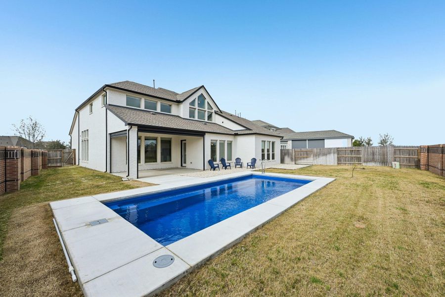 Exterior details and patio area of a home in Elyson, Katy (Image 30).