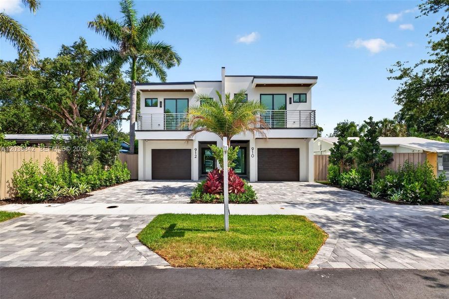Front exterior of a new home in , Fort Lauderdale, FL, highlighting curb appeal (Image 22). Front exterior of a new home in , Fort Lauderdale, FL, highlighting curb appeal (Image 22).
