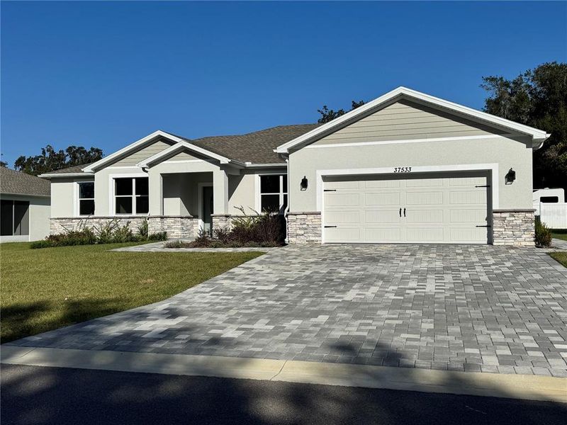 Front exterior of a new home in , Dade City, FL, highlighting curb appeal (Image 2).