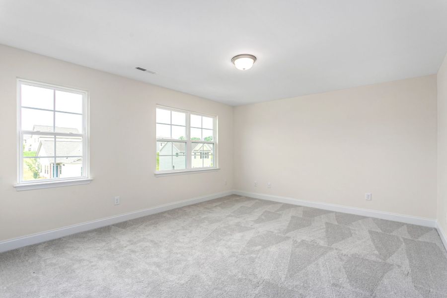 Representative unfurnished interior of a home built from the Jamestown by Keystone Homes NC in Sullivans Reserve, Walkertown (Image 20).