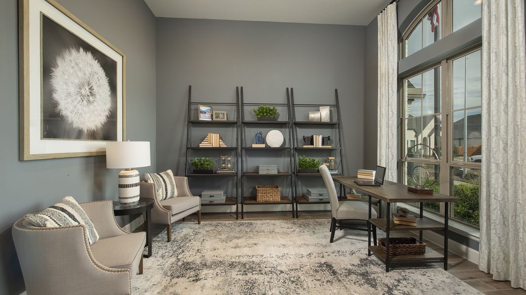 Representative furnished interior of a home built from the 3578W by Perry Homes in Lakes of Cane Island, Katy (Image 16).