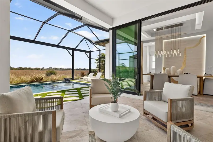 Exterior details and patio area of a home in , Sarasota (Image 3).