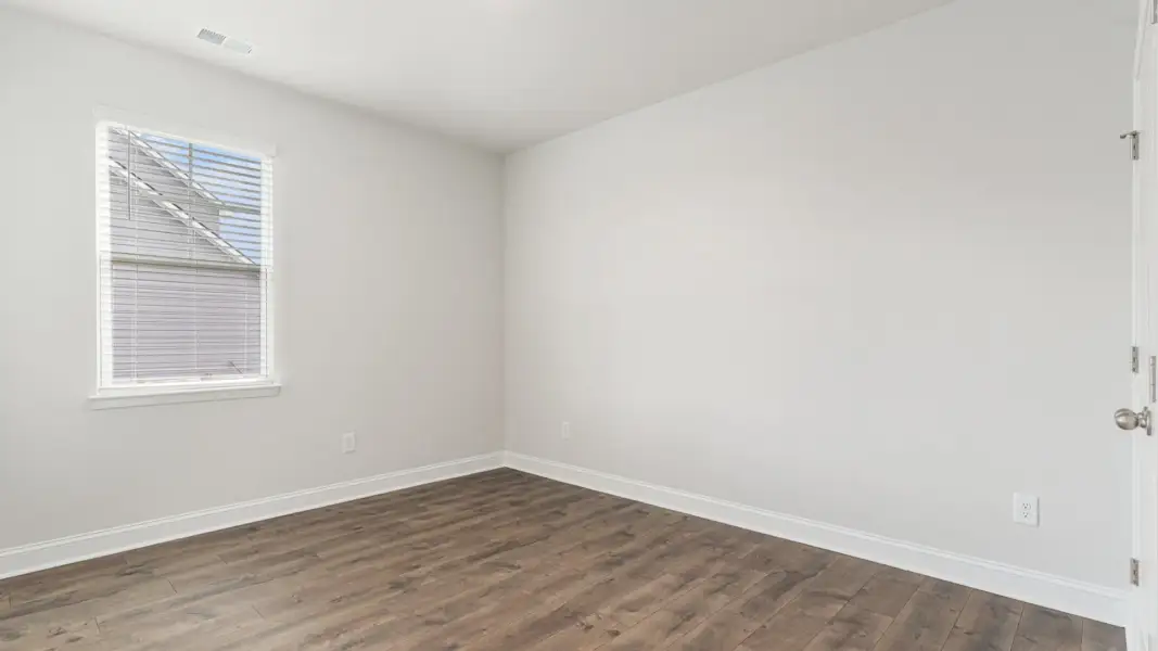 Representative unfurnished interior of a home built from the Covington by D.R. Horton in The Highlands at Cedar Hill Landing, Navassa (Image 35).
