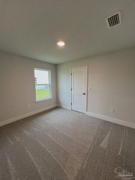 Spacious, unfurnished interior of a new home in Pine Top, Cantonment (Image 11).