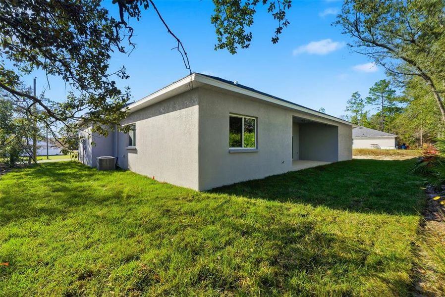Exterior details and patio area of a home in , Citrus Springs (Image 37).