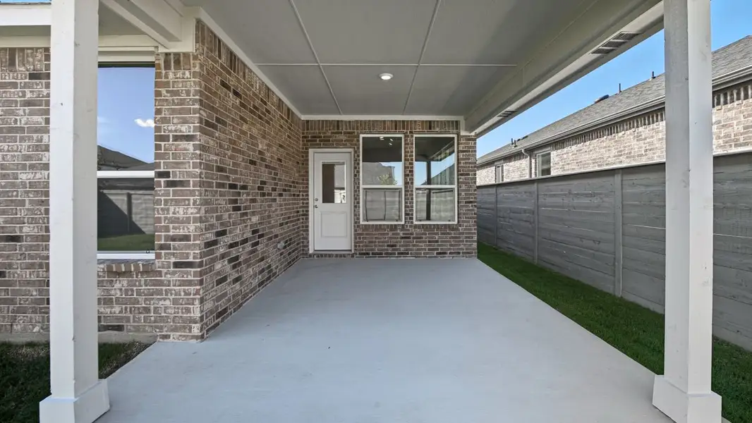 Exterior details and patio area of a home in Treeline, Justin (Image 2). Exterior details and patio area of a home in Treeline, Justin (Image 2).