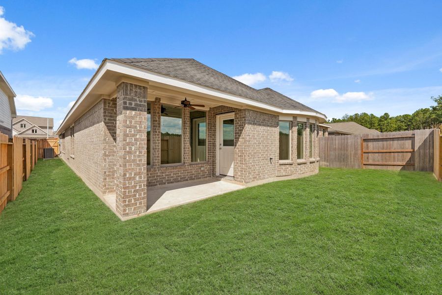 Exterior details and patio area of a home in The Trails, New Caney (Image 4). Exterior details and patio area of a home in The Trails, New Caney (Image 4).