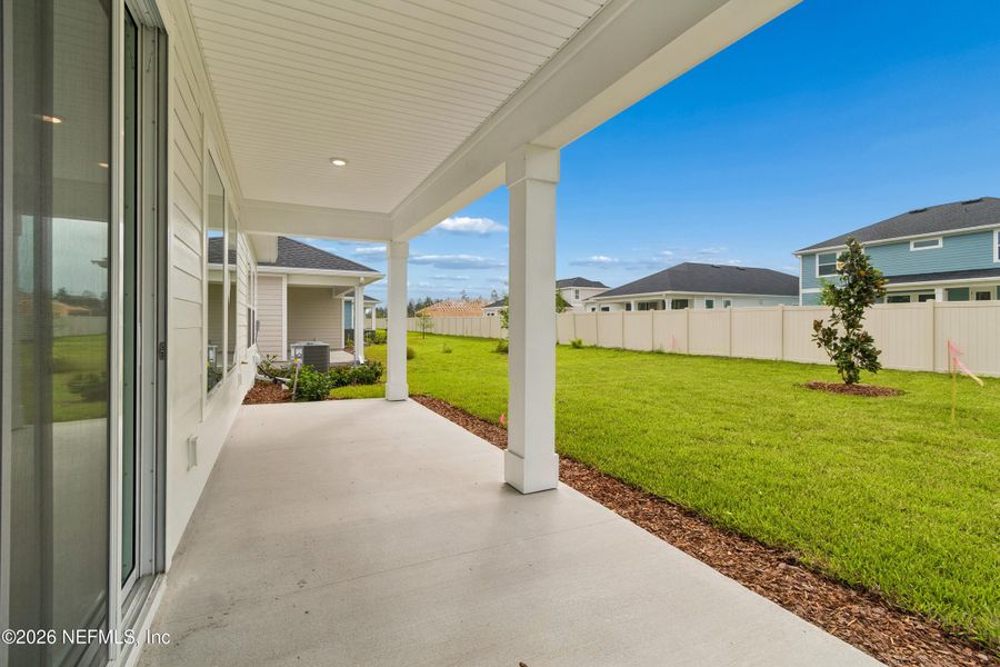 Exterior details and patio area of a home in Tributary 50', Yulee (Image 19).