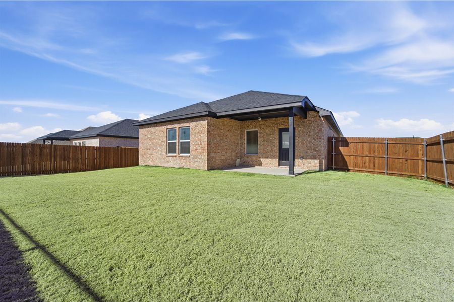 Exterior details and patio area of a home in Pebblebrook, Sherman (Image 3).