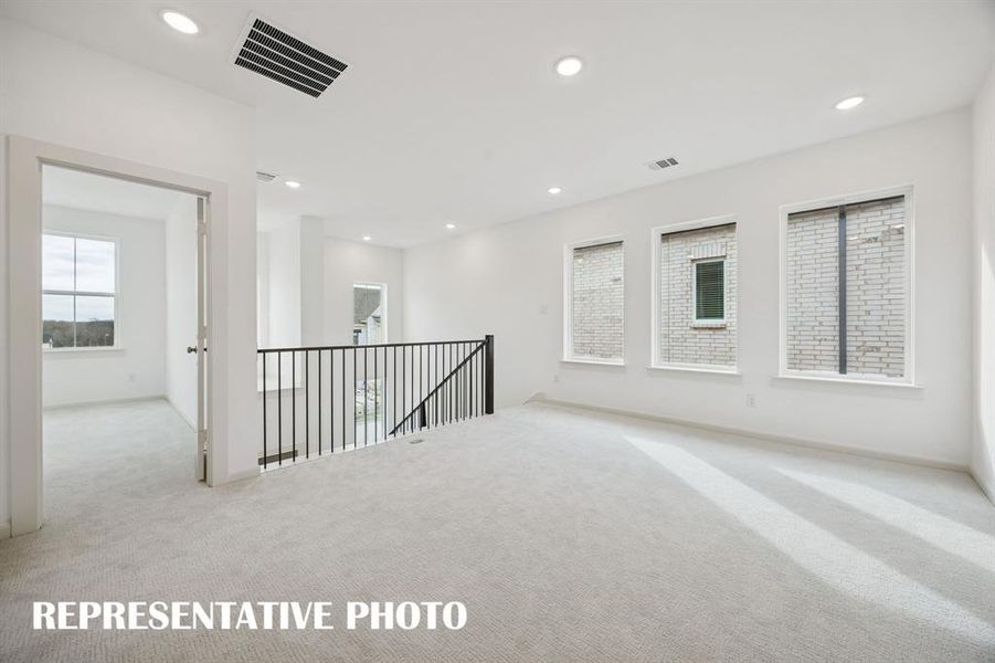 The entire family will enjoy hours of fun time in this spacious, light filled game room! REPRESENTATIVE PHOTO The entire family will enjoy hours of fun time in this spacious, light filled game room! REPRESENTATIVE PHOTO