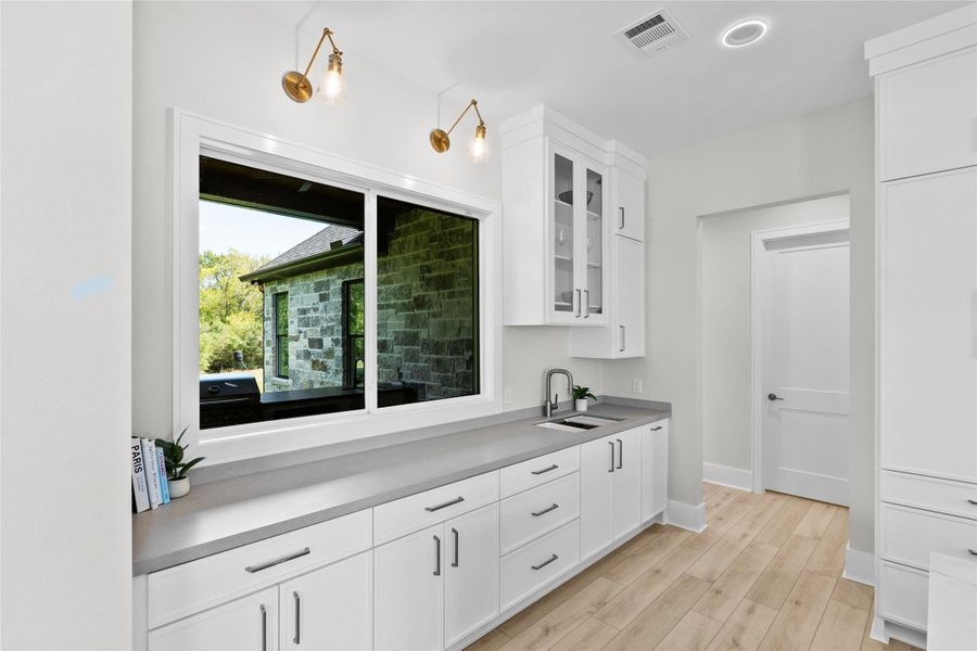 Secondary Prep Sink Overlooking Backyard