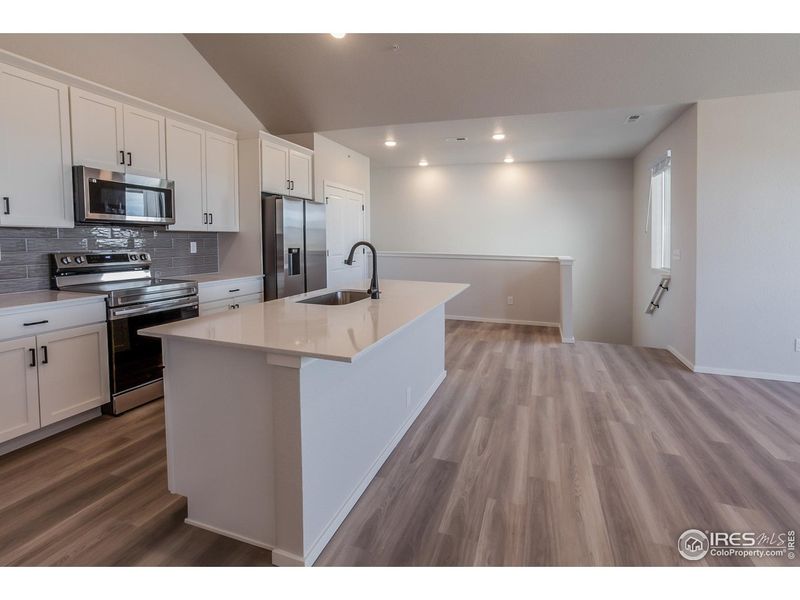 Furnished interior view inside a new home in Raindance Condos, Windsor (Image 12).