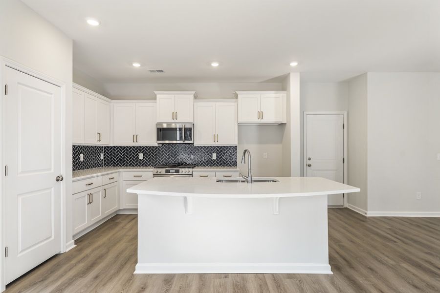 Furnished interior view inside a new home in Landing at Pine Lake, Anderson (Image 7).
