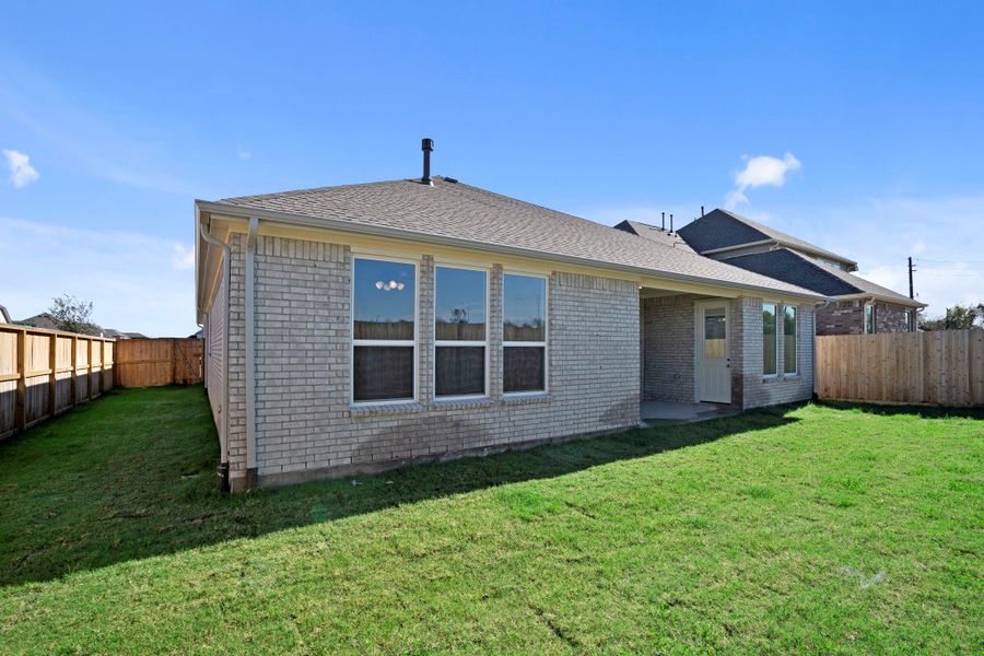 This backyard is perfect for family gatherings, social events, or simply unwinding in the fresh air.