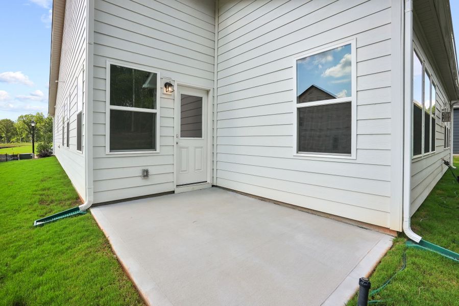 Exterior details and patio area of a home in Michaux Gardens, Belmont (Image 48).