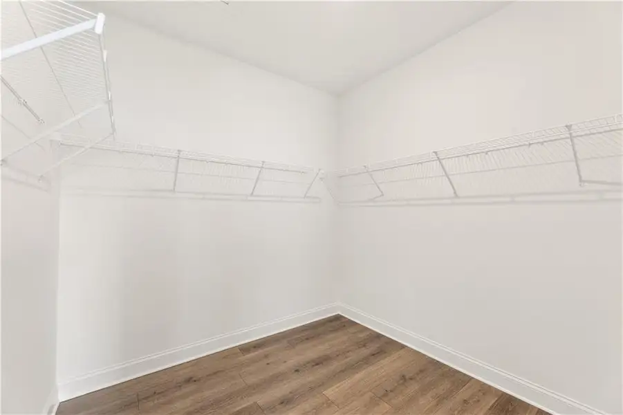 Spacious, unfurnished interior of a new home in The Courtyards at Bailey Farms, Dacula (Image 19).
